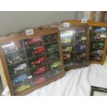 3 display cases of die cast commercial vehicles.