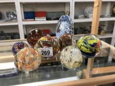 7 glass paperweights and glass dump