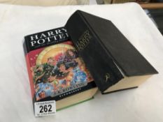 2 Harry Potter hardback books (1 missing dust cover)