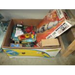 A box of old games including Airfix 144,