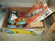 A box of old games including Airfix 144,