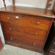 An oak 3 drawer chest.