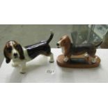 A Beswick Basset hound figure on plinth and a second Basset hound figure in the style of Beswick.