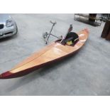 A fibre glass reinforced plywood canoe