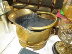 A brass coal scuttle