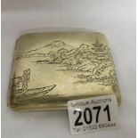 A sterling silver Japanese cigarette case.