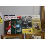 A large quantity of cigarette and tobacco advertising boards.