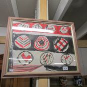 A framed and glazed British school (circa 1970's) goauche on paper abstract of circles in red,