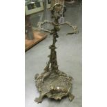 A cast brass umbrella stand.