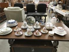 A quantity of cups, saucers, teapot, coffee pot & tureen etc. By Copeland & Wedgwood etc.