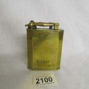 A brass Fujiama table lighter with applied plate for Ministere De Finances.