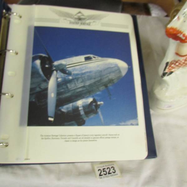 An album of Aviation Heritage first day covers and 2 other albums of stamps.