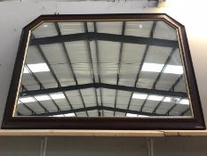 A large over mantle mirror