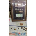 A framed and glazed Yesteryear collection of coins and banknotes together with another coin set.