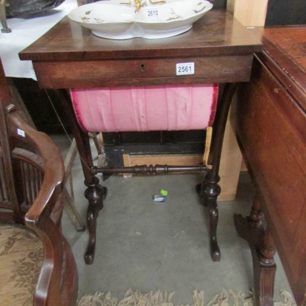 A Victorian mahogany sewing table.