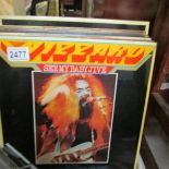 A mixed lot of LP records including Wizzard, The Move, George Harrison, Motown etc.