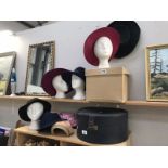 A quantity of hats and hat boxes