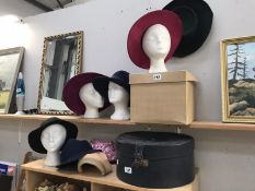 A quantity of hats and hat boxes