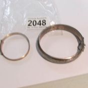 A child's silver bracelet and a silver bangle, approximately 24 grams.