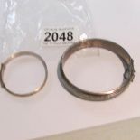 A child's silver bracelet and a silver bangle, approximately 24 grams.