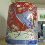 A large Chinese jardiniere decorated with birds and flowers.