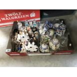 A box of misc. china and figures etc.