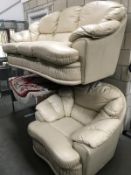 A cream leather 3 seater settee and one chair