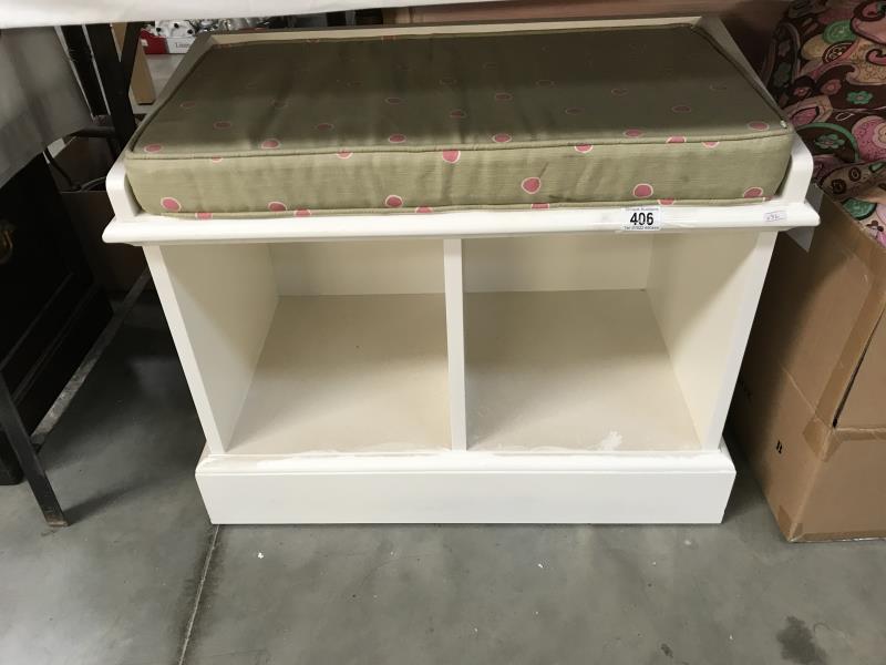 A storage cupboard/seat