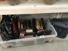 A box of purses, wallets etc.