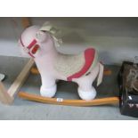 A Mamas and Papas Pink rocking horse