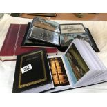 4 albums of postcards