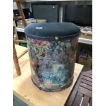 A decoupage linen bin