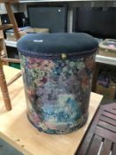 A decoupage linen bin