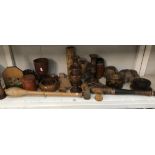 A collection of wooden items including candlesticks, vases etc.