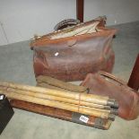 A set of cricket wickets with bat and 2 Gladstone style bags, a/f.