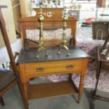 A satin walnut wash stand with marble top.