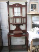 An Edwardian mahogany hall stand