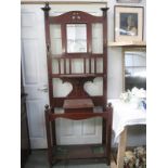 An Edwardian mahogany hall stand