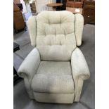 An electric reclining armchair