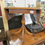 A small mahogany drop side table.