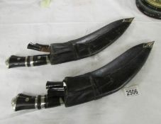 2 Kukri's complete with skinning knives.