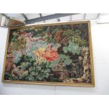 A large gilt framed tapestry