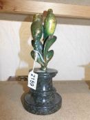 A pair of cold painted bronze budgies on a marble base.