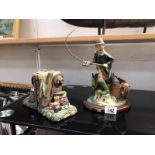 Pair of fishing themed book ends and a figure 'hooked on Fishing' by Brian Andrew,