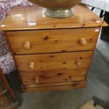 A small pine 3 drawer chest.