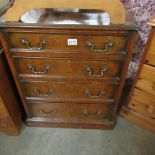 A small 4 drawer chest.