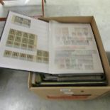 A miscellaneous box of philatelic material including stamps and catalogues.