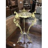 An ornate brass table