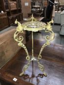 An ornate brass table