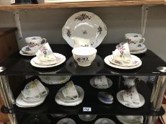 2 shelves of china including a Duchess Violetta tea set